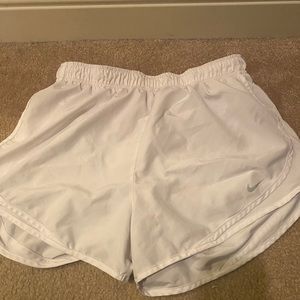 White Nike shorts
